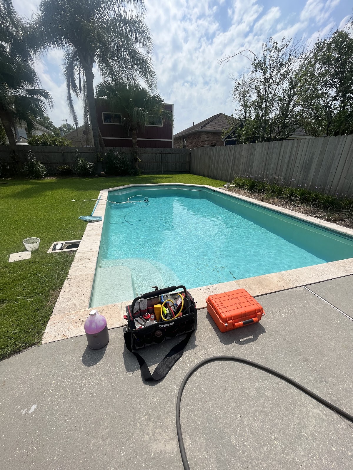 Leak-detection equipment set up beside a residential swimming pool