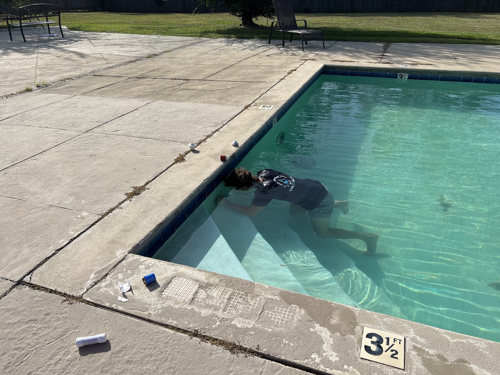 LA Leak Detection specialist inspecting a swimming pool underwater